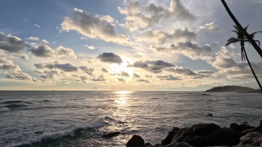 A beautiful nighttime timelapse showing large waves crashing on breakwaters along Sri Lanka