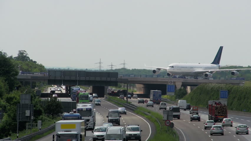 Aircraft rolled over the motorway bridge
