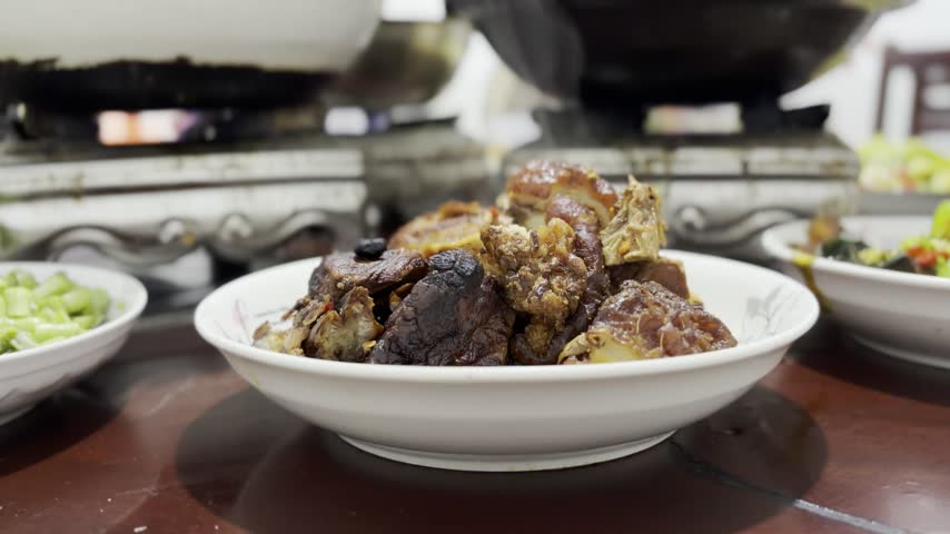 Close up of a Chinese banquet in Hunan, comprehensive of various traditional spicy dishes of the region.