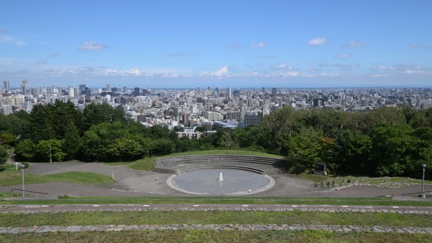 Sapporo cityscape panorama from Asahiyama Park overlook, Hokkaido urban landscape view