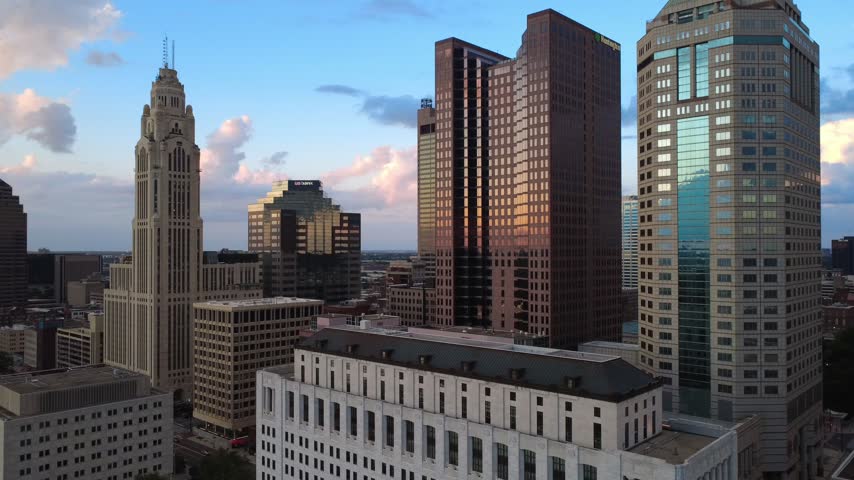 Drone shot of Columbus, Ohio Skyline featuring the LeVeque Tower, the Ohio Supreme Court Building, and the Vern Riffe State Office Tower