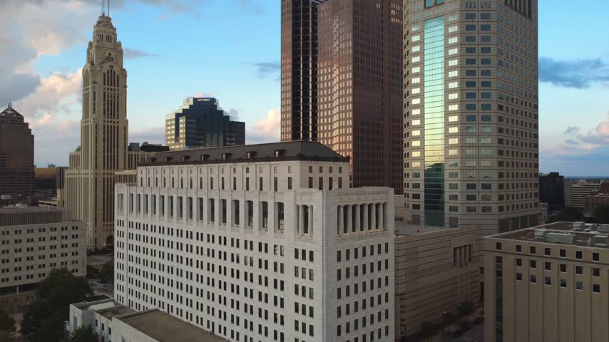 Drone shot of Columbus, Ohio Skyline featuring the LeVeque Tower, the Ohio Supreme Court Building, and the Vern Riffe State Office Tower