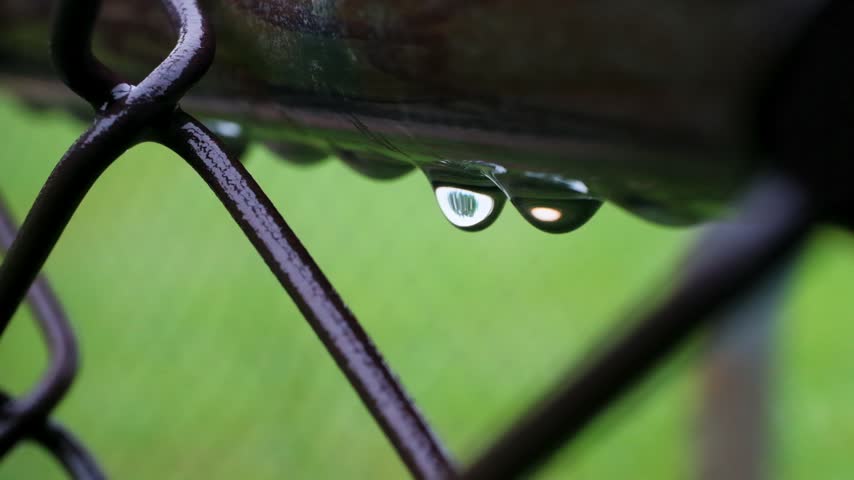 Raindrops on Metal Chain Link Fence Macro Nature Video