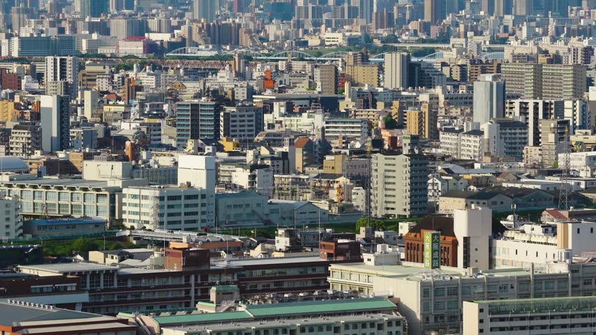 Morning Reveal of Osaka City, Umeda Skyline in Distance, Japan. Summer Morning