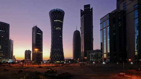 DOHA, QATAR - CIRCA 2011 - Newly built Skyline, right to left Palm Tower, Burj Qatar, Tornado Tower, TIME LAPSE (4k versions available. Search on Clip IDs 14267462 and 14267453)