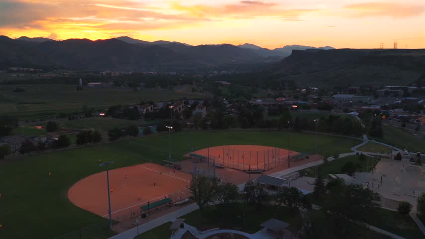 Softball players game Ulysses Sports Complex Field Skatepark City of Golden aerial drone Colorado summer sunset Rocky Mountains Front Range foothills Clear Creek South Table Mountain circle left