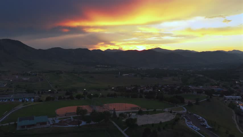 Ulysses Sports Complex Field under lights Skatepark summer sunset City of Golden aerial drone Colorado Rocky Mountains Front Range foothills Clear Creek Canyon South Table Mountain forward down