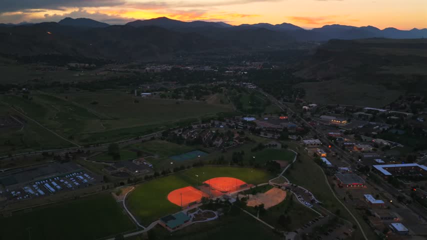 Ulysses Sports Complex Field Skatepark summer golden hour sunset City of Golden aerial drone Colorado Rocky Mountains Front Range foothills Clear Creek Canyon South Table Mountain backwards pan up