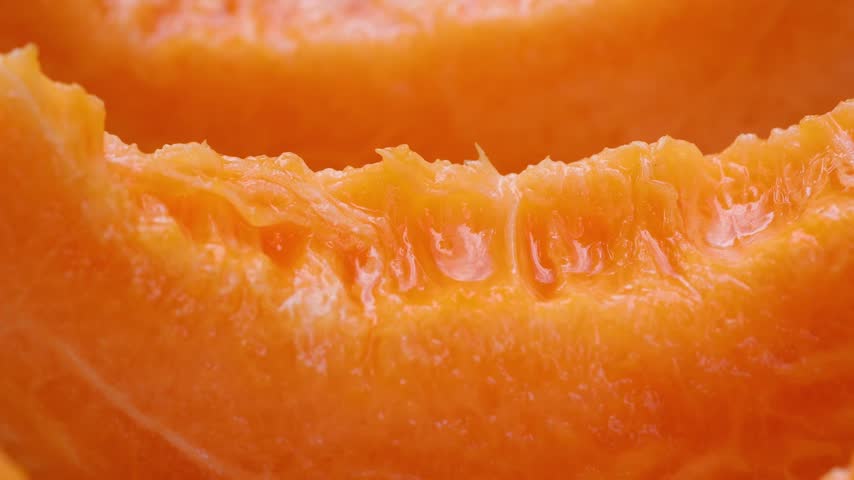 Sliced pieces of fresh sweet cantaloupe melon
