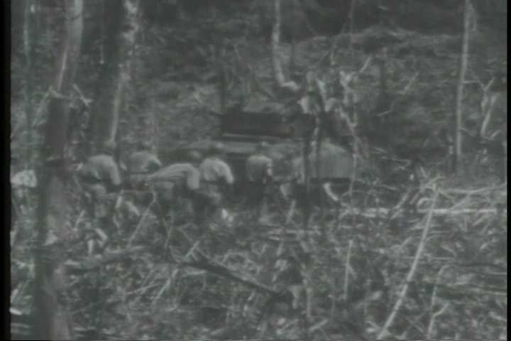 1940s - American troops take New Britain island during World War Two.