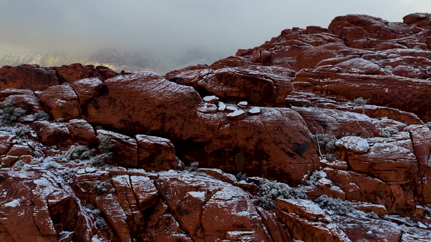 Aerial Red Rock Canyon Nevada Snowy Desert Landscape Fly Through