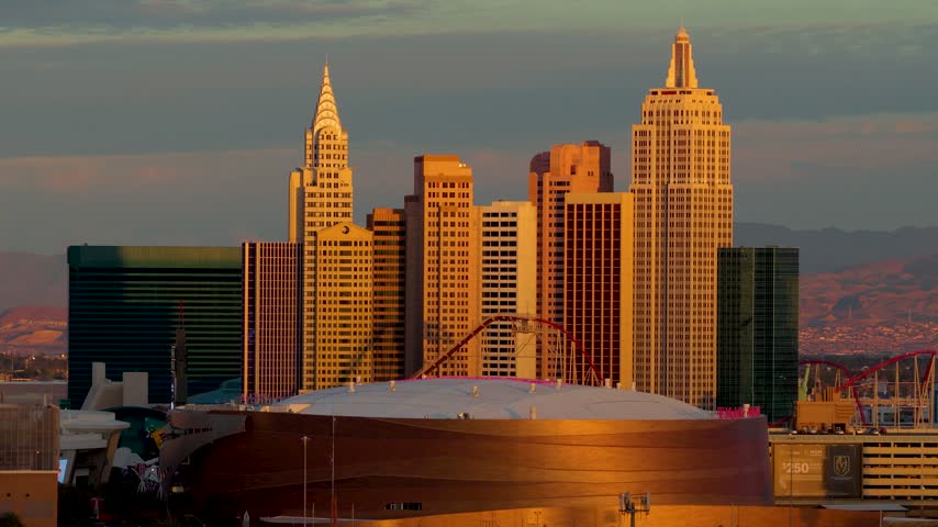 Aerial Las Vegas South Strip NY NY Hotel Cityscape and Airplane Flyover