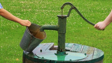 Man powered water pump at the well