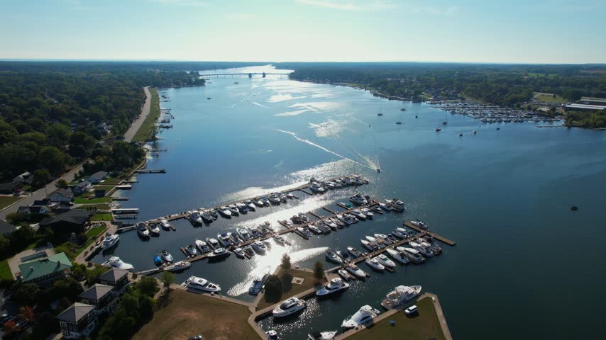 Orbital of boats and marina Aerial of Sturgeon Bay Wisconsin in Door County during the fall.  