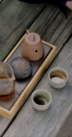 Chinese Tea Set with Bamboo Tray, Ceramic Teapot and Matching Cups and Cha Hai. Brewing and Tea Experience. Authentic Chinese Tea Ceremony. Vertical.