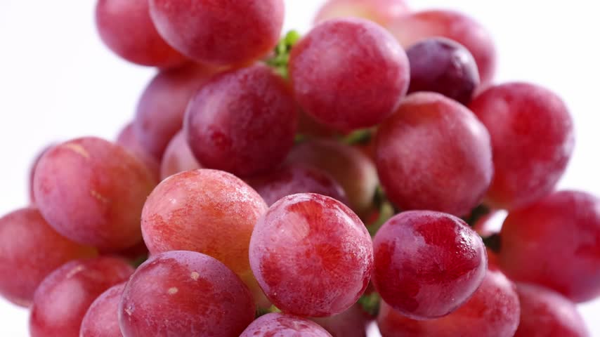 Red Grapes Rotating on a Plate	