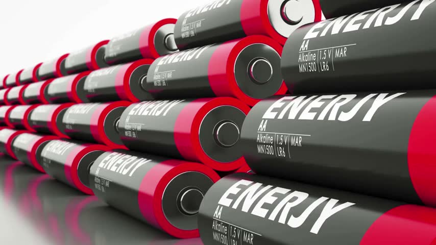 Close-up view of numerous batteries stacked in an organized manner, showcasing energy capacity and power. Emphasis on design and material qualities, ideal for technology and innovation themes.
