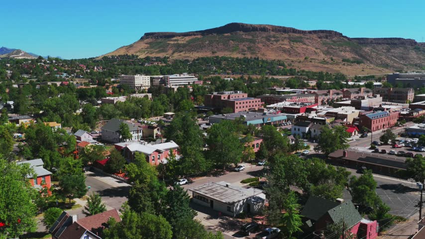 Downtown Golden historic West of Denver small town Colorado aerial drone Front Range Rocky Mountains Foothills summer morning blue sky sunny Table Mountain Mesa neighborhood coffeee circle right