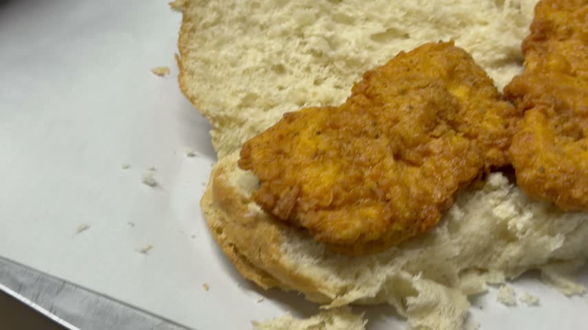 Fried Chicken on a Gatsby roll at a take away.