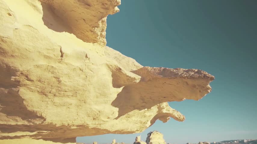 White Desert and Black Desert in Egypt captured during a scenic hiking adventure, showcasing surreal chalk formations, dark volcanic hills, rugged trails and expansive Sahara wilderness. A cinematic journey through one of Egypt’s most unique desert landscapes.
