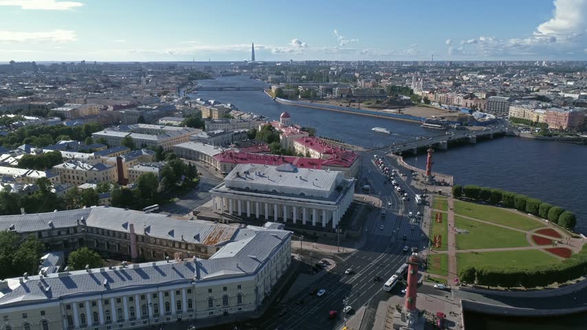 Aerial view of the Spit of Vasilyevsky Island with the Rostral Columns and the Old Saint Petersburg Stock Exchange along the Neva River in Saint Petersburg, Saint Petersburg, Russia.
