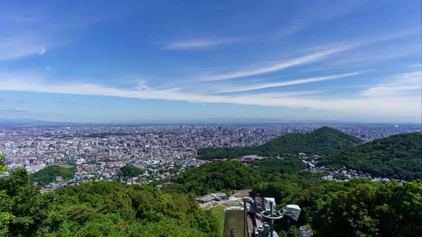 Time lapse of panoramic aerial view of Sapporo city skyline from Okurayama Observatory, Hokkaido, Japan.
