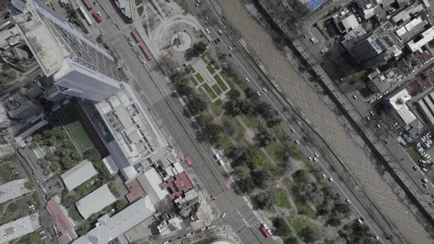 Vertical Aerial View Moving Forward Over Santiago Cityscape and Mapocho River