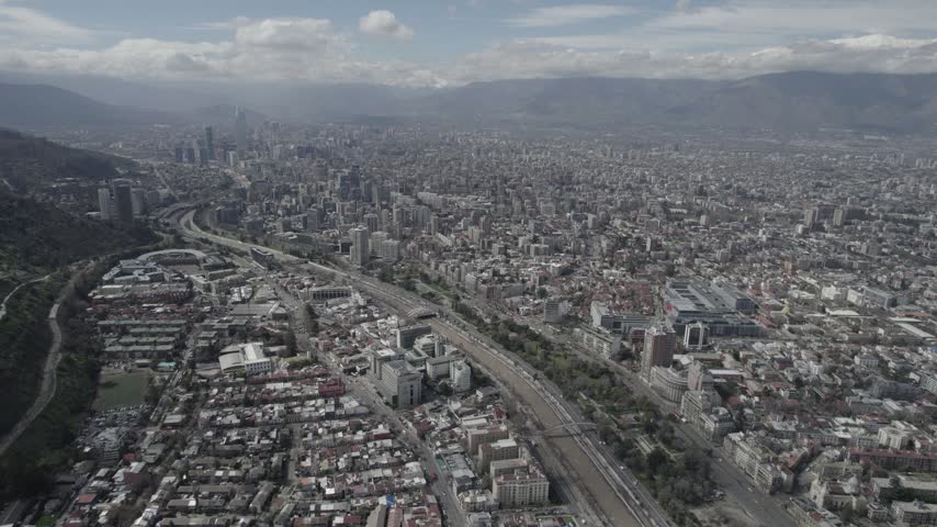 Drone Flight Over Santiago de Chile Highlighting City and Mountains