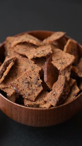 Croutons or crackers made from rye bread with garlic, salt, and spices. Croutons with salt