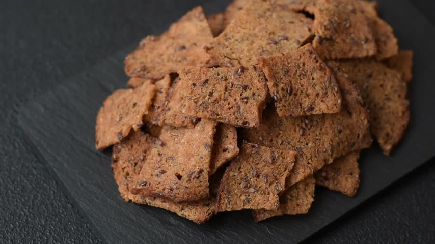 Croutons or crackers made from rye bread with garlic, salt, and spices. Croutons with salt