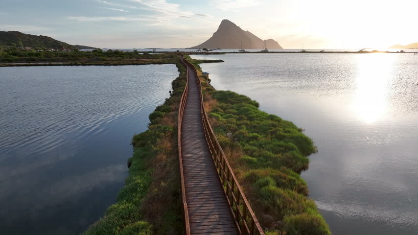 Aerial view of Porto Taverna and sunrise near Tavolara, Sardinia