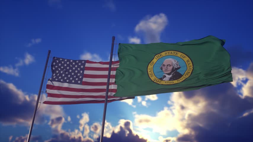 Washington State Flag And United States Flag Waving Against Dramatic Sky