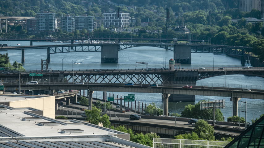 Time Lapse Where Boats And Cars Cross The Willamette In Portland Oregon