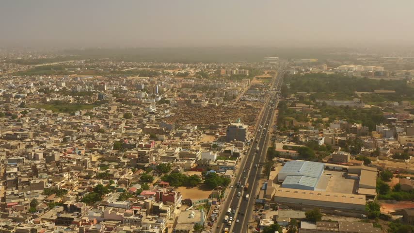 Aerial view of the large holy city Touba stretching across the horizon in Senegal