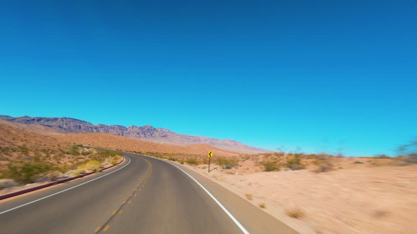 Driving Lake Mead National Recreation Area Nevada Desert Road POV.