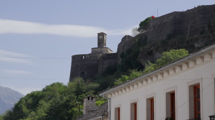 Gjirokastër Fortress prominent clock tower rising above the town in southern Albania