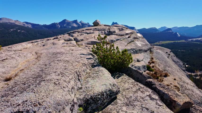 Panoramic view captures Yosemite Valley from the top of Lembert Dome in Yosemite National Park
