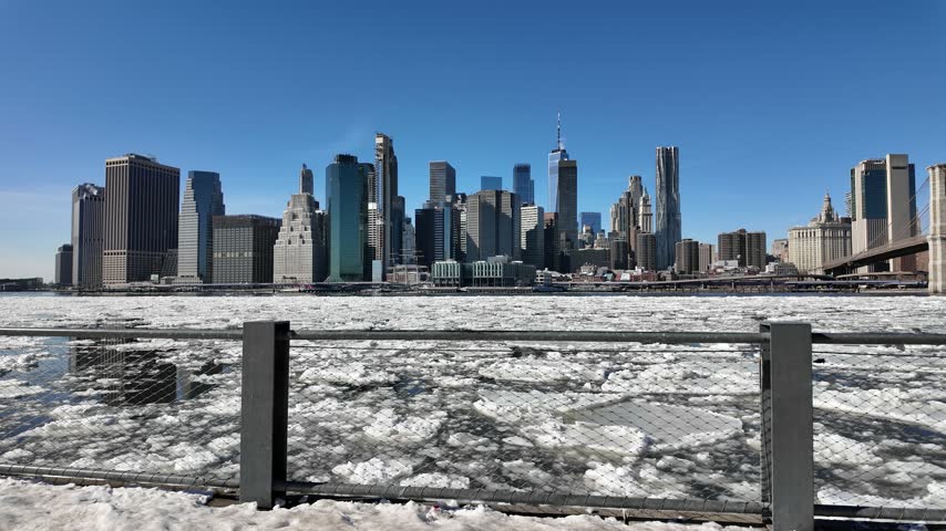 New York city skyline with frozen East river Brooklyn view