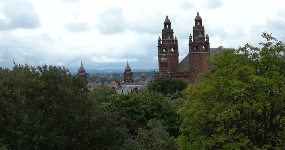 Kelvingrove Art Gallery and Museum above trees in Glasgow, Scotland