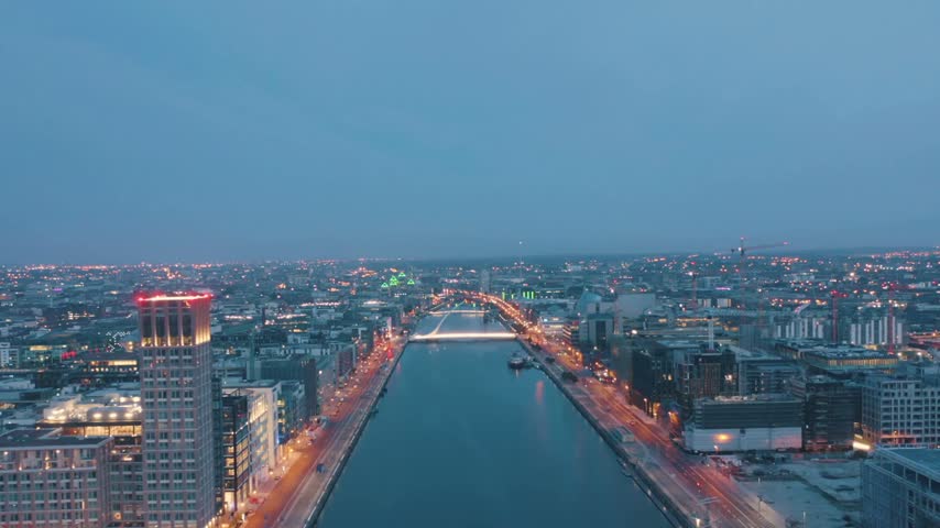 4K Aerial Drone View Flying Over Dublin City at Night with Glowing City Lights and Epic Urban Skyline