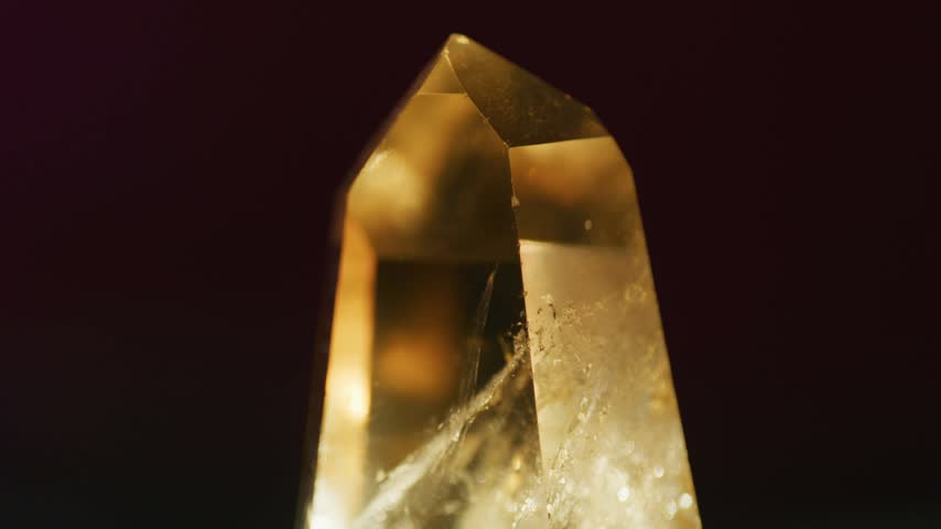 Macro Smoky Quartz Crystal Rotating in Sunlight, Slow Motion