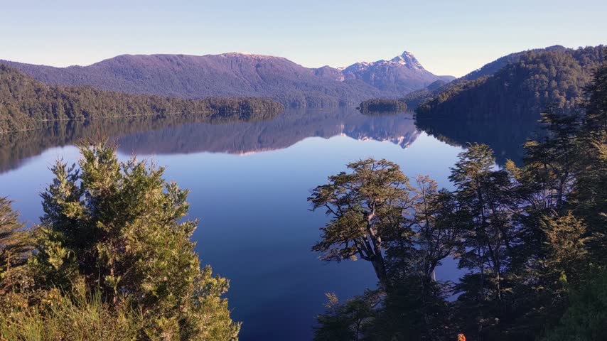Calm Glacial Lake and Forested Andes Mountains in Patagonia Argentina
