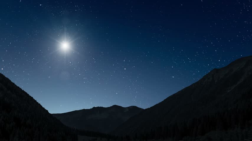 Glowing Christmas star above a peaceful mountain landscape