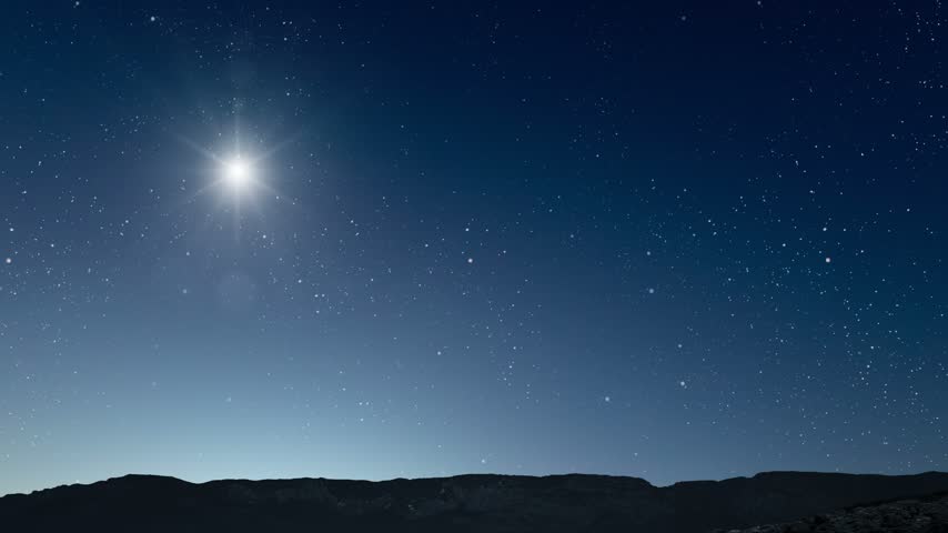 Glowing Christmas star above a peaceful mountain landscape