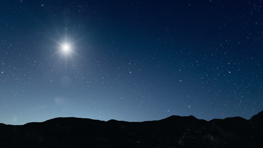 Glowing Christmas star above a peaceful mountain landscape