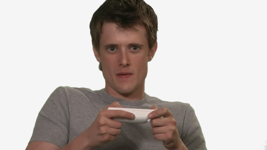 young adult man plays video game and wins on white background