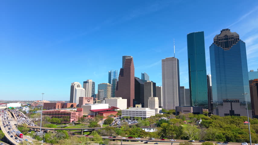 Aerial view of Houston, Texas with dense commercial district and busy roadways. Modern buildings in city impressive skyline.