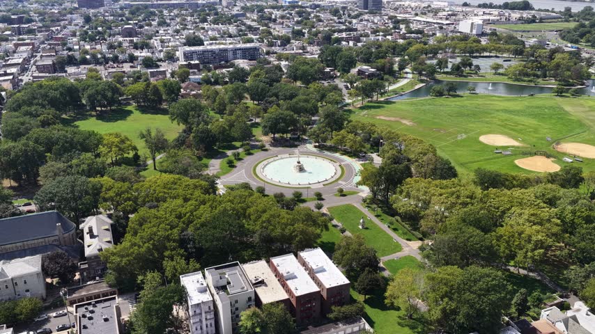 Aerial View of Jersey City Parks and Skyline Near New York Harbor.