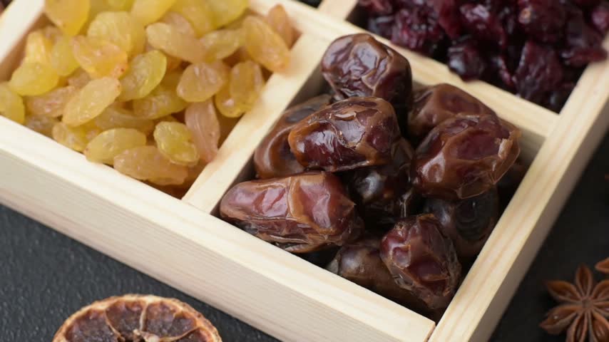 Dried fruits and berries, cranberries, dates, and raisins for a healthy diet. Dried berries and fruits