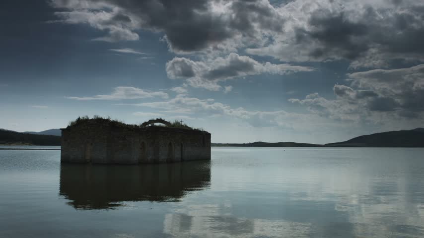Old christian church under water in dam Zhrebchevo Reservoir, Bulgaria.